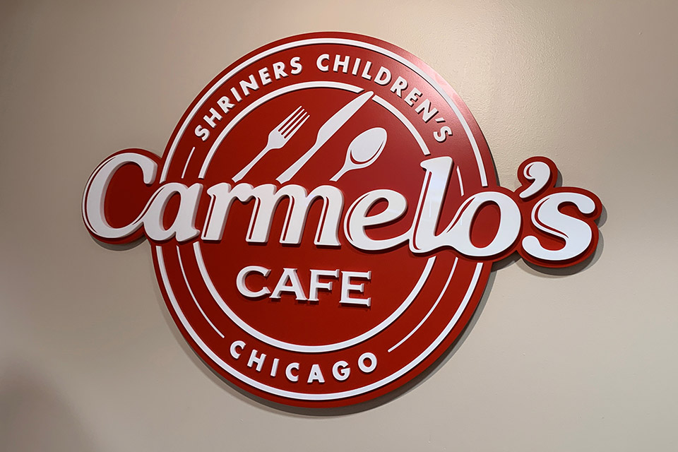 Carmelo's Cafe sign