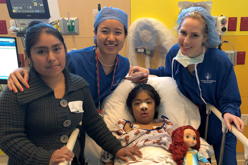 patient, mother and two staff members