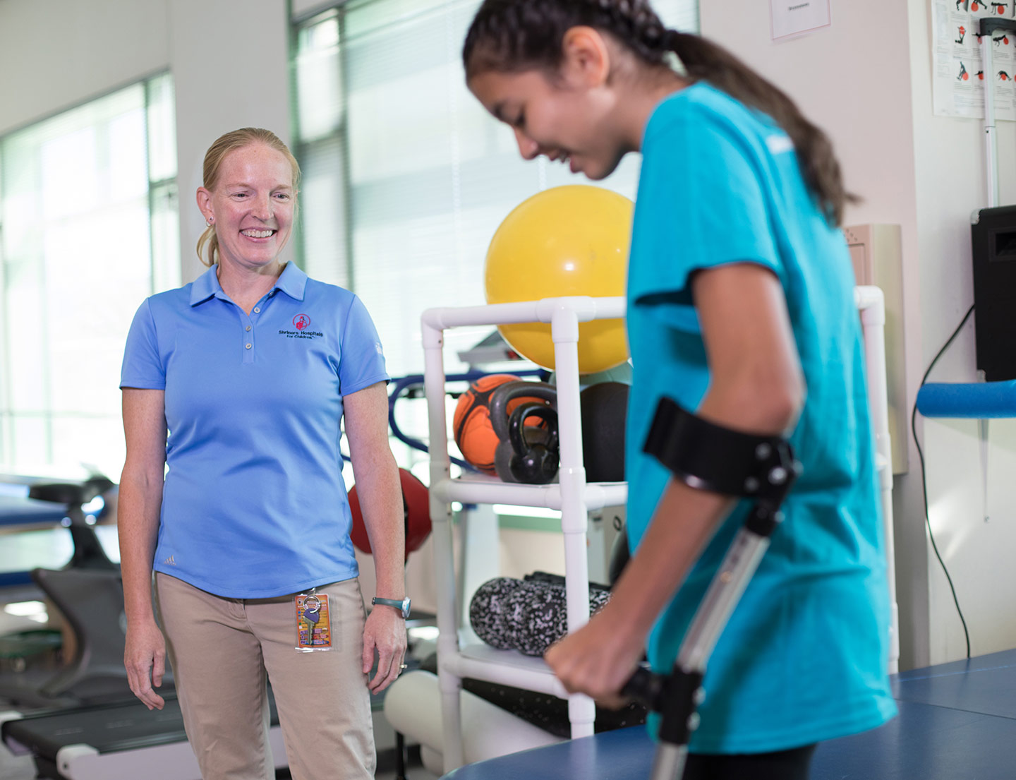 female patient and physical therapist