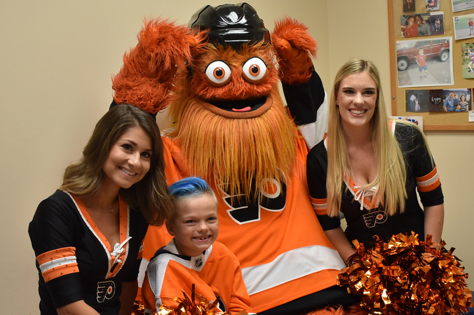 Philadelphia hockey mascot, cheerleaders and patient