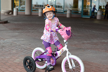 patient riding adaptive tricycle