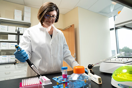 female researcher working in lab