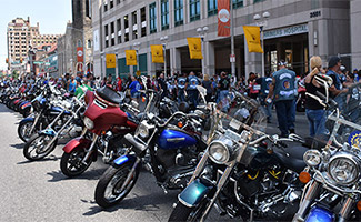 Motorcycles parked in front of hospital