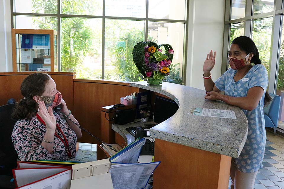 patient and receptionist