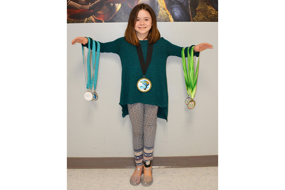 Zuleikha with gymnastics medals