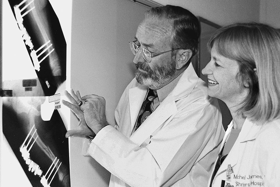 two physicians viewing X-ray