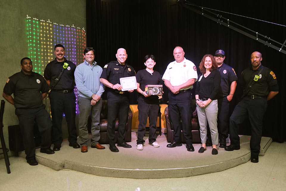 Massachusetts Department of Fire Safety Video Contest Winner with firefighters and staff