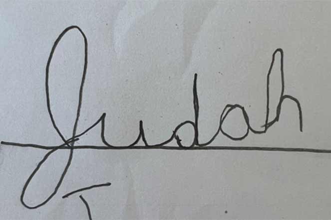 Judah's cursive writing sample of his name