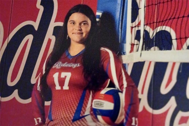 jaedin in her volleyball uniform