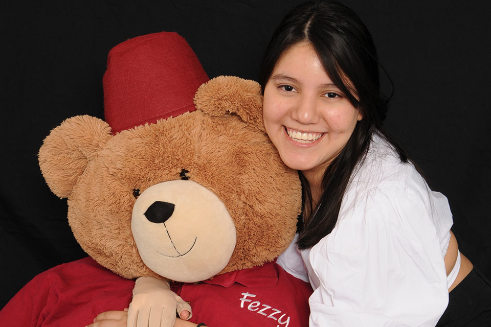 Belen with Fezzy the Bear