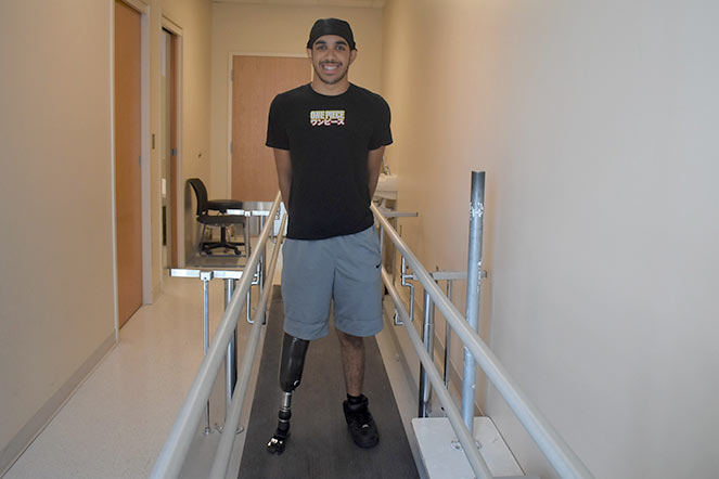 Enzo wearing new prosthetic device