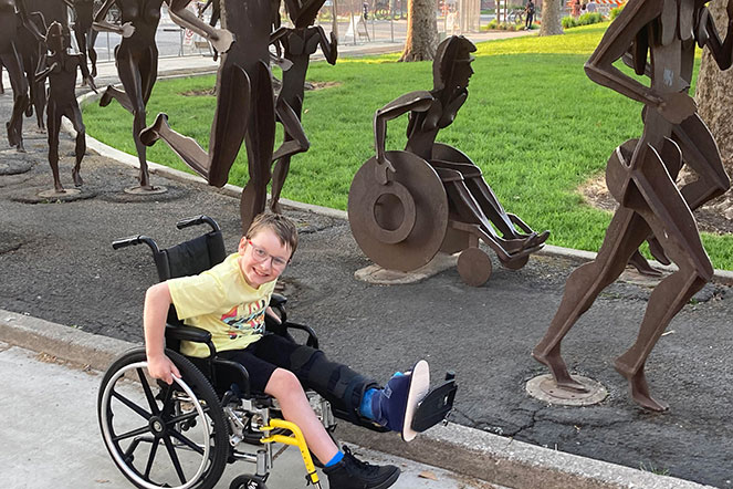 Mason using wheelchair