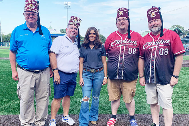 Madison with four Shriners