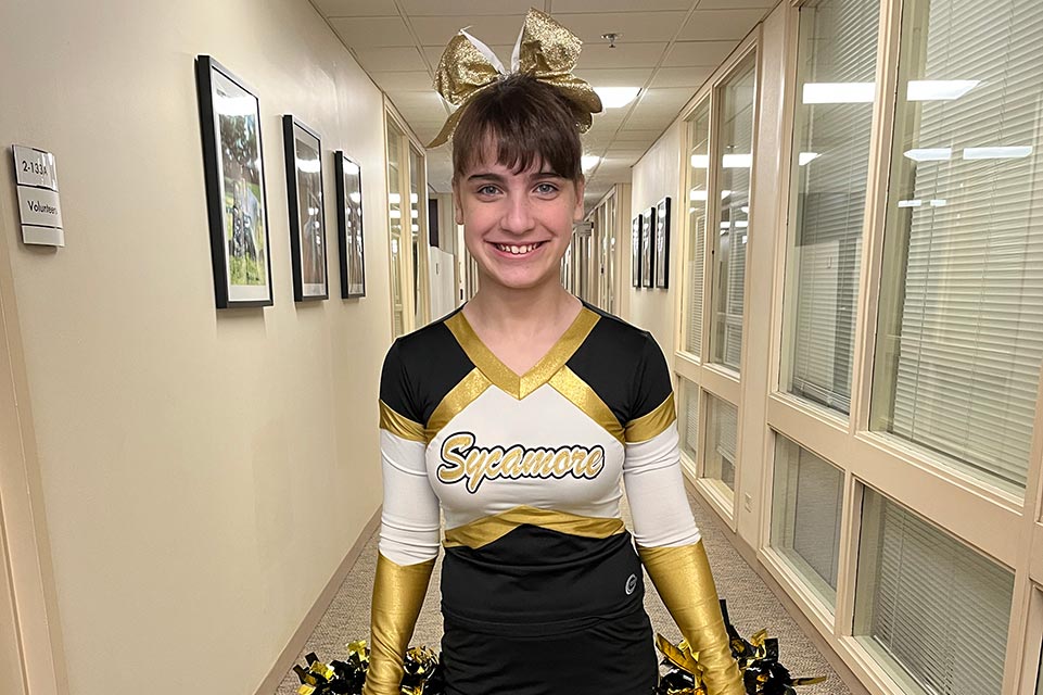 Abbey wearing cheer outfit