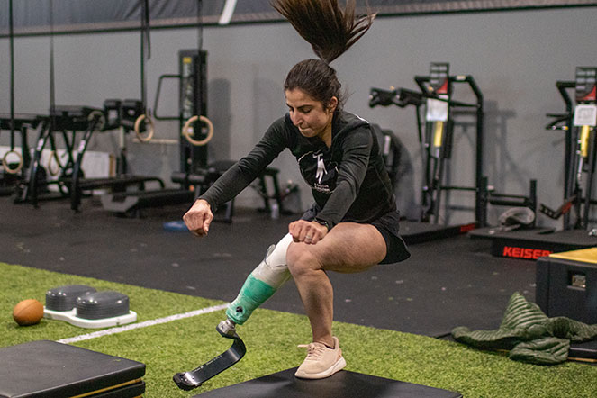 female wearing prosthetic working out