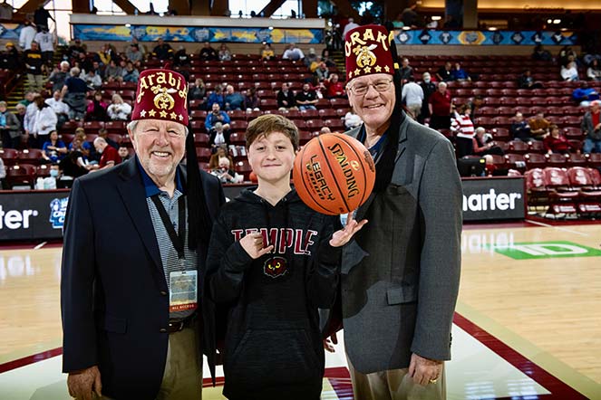 Cole with Bill Bailey and Jerry Gantt, member of Shriners Children's Joint Boards