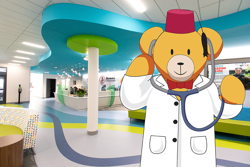 Illustration of Fezzy bear in hospital lobby