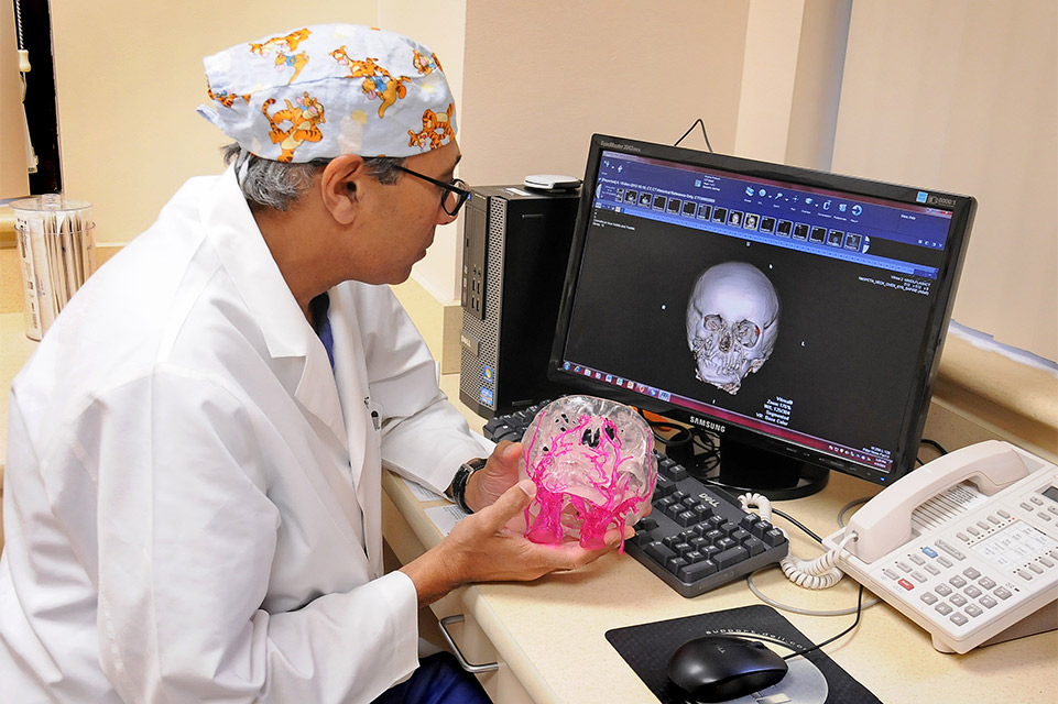 physician with 3d printed jaw