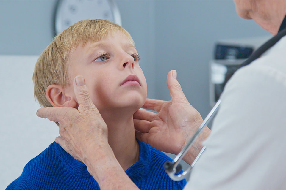 physician examines male patient